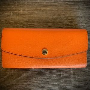 Michael Kors wallet orange, excellent condition.